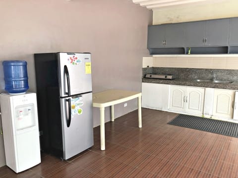 4 Bedroom House  | Private kitchen | Full-size fridge, stovetop, cookware/dishes/utensils, dining tables