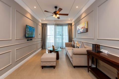 Deluxe Condo, 2 Bedrooms, Kitchen, Beach View | Living area | 43-inch Smart TV with digital channels, TV, fireplace