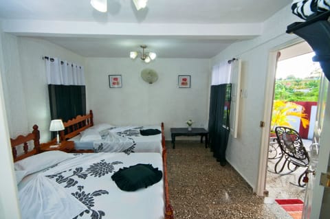 Basic Triple Room, Multiple Beds, Non Smoking | Minibar, iron/ironing board, bed sheets