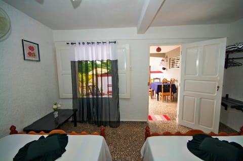 Basic Triple Room, Multiple Beds, Non Smoking | Minibar, iron/ironing board, bed sheets