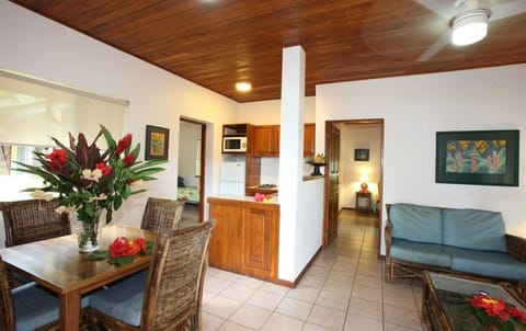 Suite, 2 Bedrooms, Pool View | Living area | 54-cm flat-screen TV with satellite channels, TV, DVD player