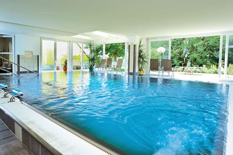 Indoor pool, outdoor pool, open 8:00 AM to 8:00 PM, pool umbrellas