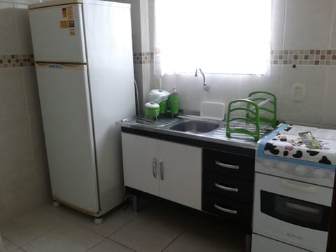 Family Apartment, Multiple Beds, Non Smoking | Private kitchen | Full-size fridge, microwave, oven, cookware/dishes/utensils