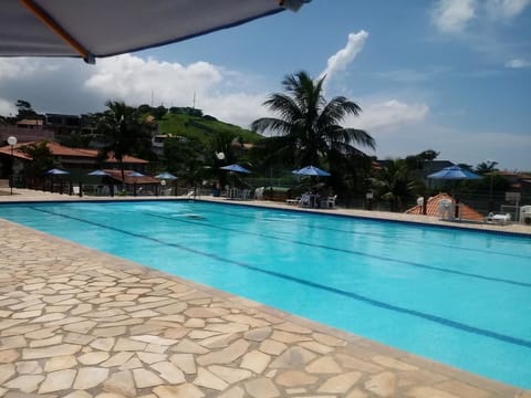 2 outdoor pools, open 9 AM to 6 PM, pool umbrellas, sun loungers