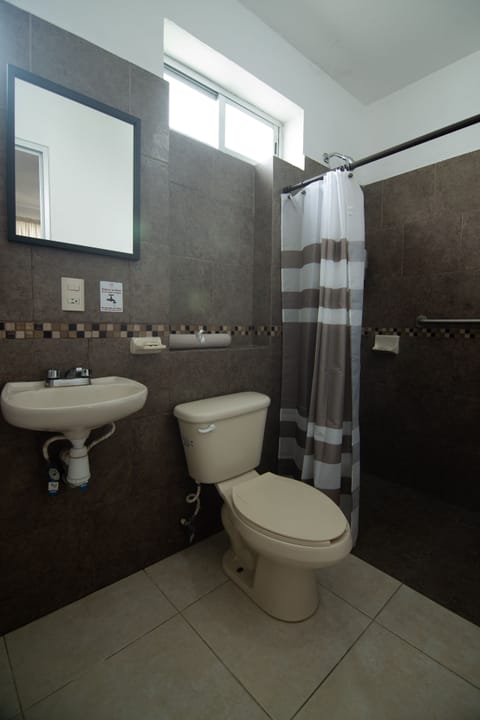 Junior Room, Non Smoking | Bathroom | Shower, free toiletries, towels