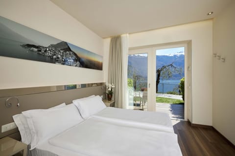 Standard Double or Twin Room, Partial Lake View, Garden Area | In-room safe, free WiFi, bed sheets