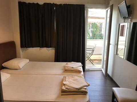 Twin Room, Balcony | Iron/ironing board, free WiFi, bed sheets