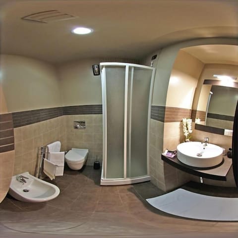 Shower, eco-friendly toiletries, hair dryer, bidet