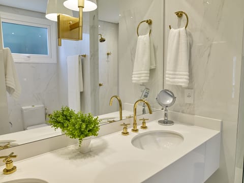 Grand Prestige | Bathroom | Designer toiletries, hair dryer, bathrobes, slippers