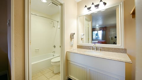 Standard Room, 1 King Bed, Non Smoking, Refrigerator & Microwave | Bathroom | Combined shower/tub, free toiletries, hair dryer, towels