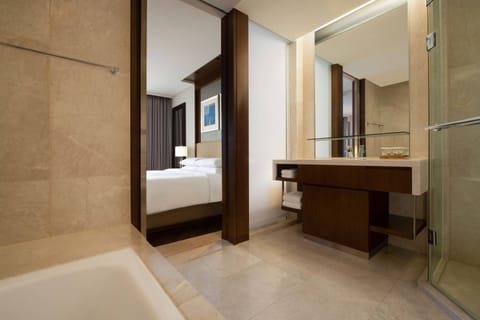 Suite, 1 Bedroom | Bathroom | Free toiletries, hair dryer, slippers, towels