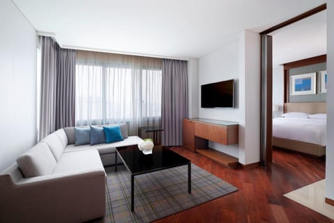 Suite, 1 Bedroom | Living area | 32-inch LCD TV with cable channels, TV