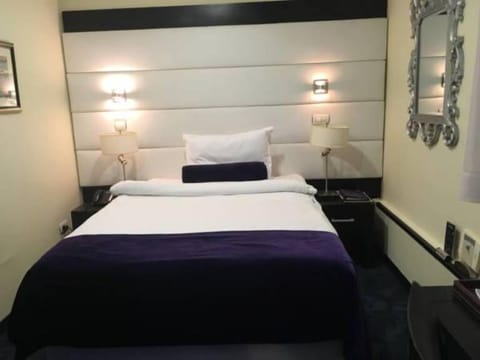 Single Room | Select Comfort beds, in-room safe, desk, iron/ironing board