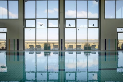 Indoor pool, open 8:00 AM to 9:00 PM, sun loungers