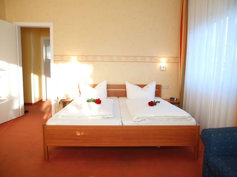 Double or Twin Room | Minibar, desk, blackout drapes, free WiFi