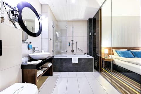 Superior Room | Bathroom | Hair dryer, slippers, towels