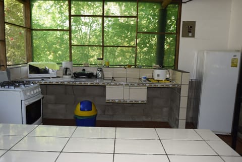 Bungalow, 2 Bedrooms | Private kitchen | Fridge, microwave, stovetop, cookware/dishes/utensils