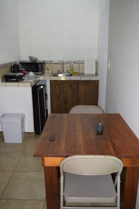 Apartment (Mini) | Private kitchen | Fridge, microwave, stovetop, cookware/dishes/utensils