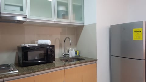 Luxury Apartment, 1 Bedroom | Private kitchenette | Full-size fridge, microwave, stovetop, cookware/dishes/utensils