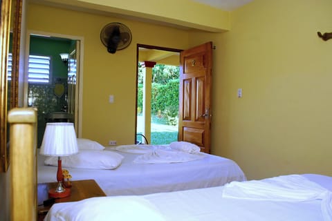 Economy Triple Room, Multiple Beds, Non Smoking | Minibar, in-room safe, free WiFi, bed sheets