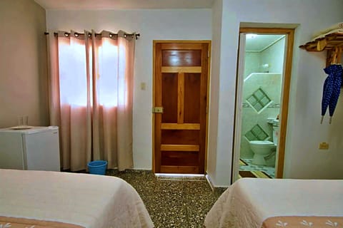 Basic Quadruple Room, 2 Double Beds | Iron/ironing board, bed sheets