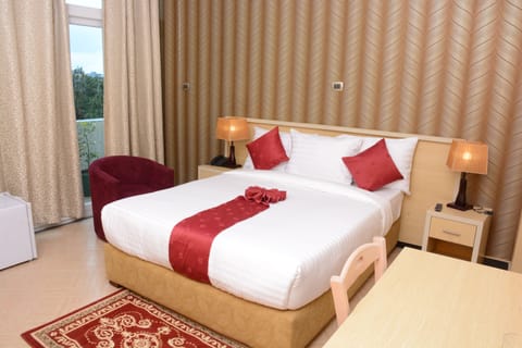 Deluxe Double Room, 1 Queen Bed, Non Smoking | In-room safe, individually decorated, desk, soundproofing