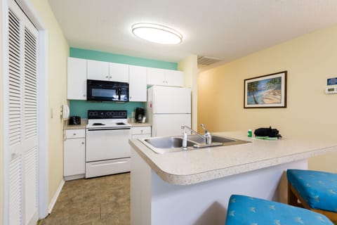 Condo, 2 Bedrooms | Private kitchen | Fridge, microwave, stovetop, dishwasher