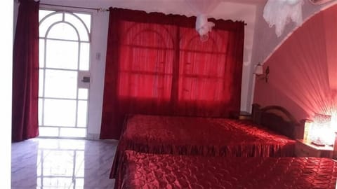 Romantic Quadruple Room, 2 Double Beds, Mountain View | Minibar, in-room safe, individually decorated, individually furnished