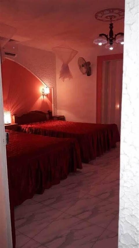 Romantic Quadruple Room, 2 Double Beds, Mountain View | Minibar, in-room safe, individually decorated, individually furnished