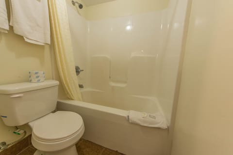 Double Room, 2 Double Beds, Smoking | Bathroom | Combined shower/tub, hair dryer, towels