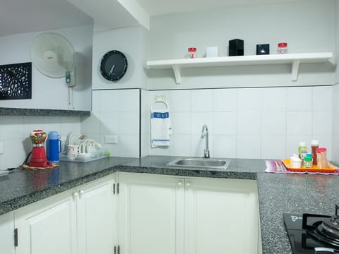 Fridge, stovetop, cookware/dishes/utensils