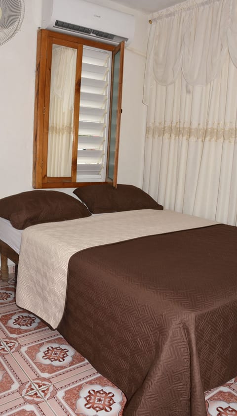 Twin Room | Minibar, iron/ironing board, bed sheets