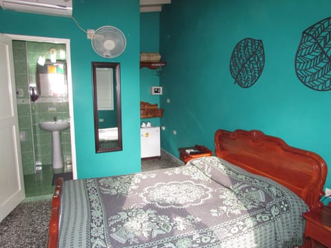 Double Room | Minibar, in-room safe, iron/ironing board, bed sheets