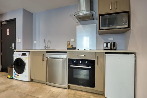 One Bedroom Suite | Private kitchen | Mini-fridge, microwave, oven, stovetop