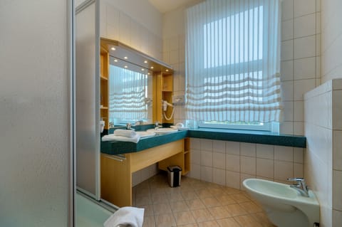 Double Room | Bathroom | Hair dryer, bathrobes, towels