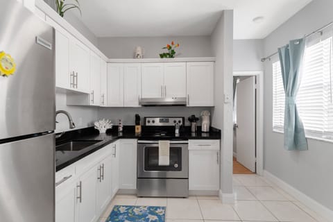Ground Floor Apartment | Private kitchen | Fridge, microwave, oven, stovetop