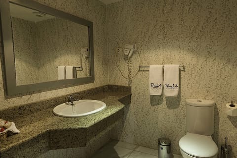 Junior Suite, Pool View | Bathroom | Eco-friendly toiletries, hair dryer, towels, soap