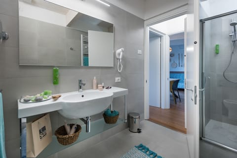 Shower, eco-friendly toiletries, hair dryer, bidet