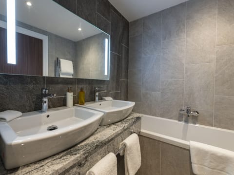 Separate tub and shower, eco-friendly toiletries, hair dryer, bathrobes