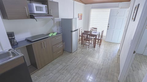 Family Apartment (1) | Private kitchen | Full-size fridge, microwave, stovetop, coffee/tea maker