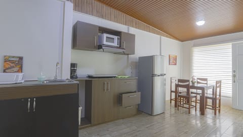 Family Apartment (1) | Private kitchen | Full-size fridge, microwave, stovetop, coffee/tea maker