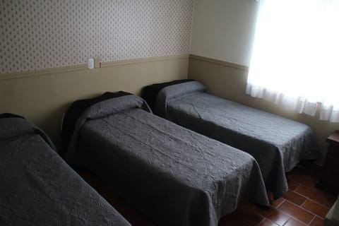 Standard Triple Room, 3 Twin Beds, Non Smoking | Free WiFi, bed sheets