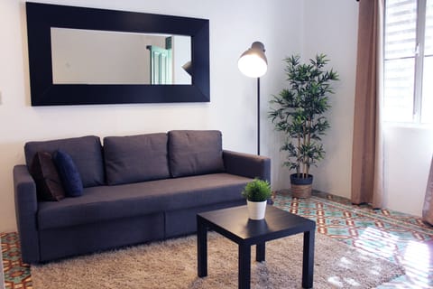 Apartment, 2 Bedrooms | Living room | Flat-screen TV