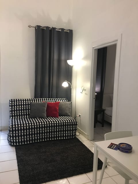 Apartment, 1 Bedroom | Living area | Flat-screen TV