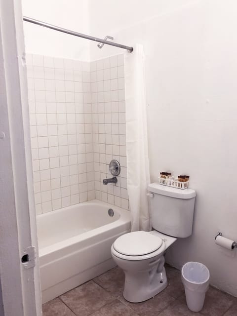Apartment, 2 Bedrooms | Bathroom | Combined shower/tub, deep soaking tub, towels