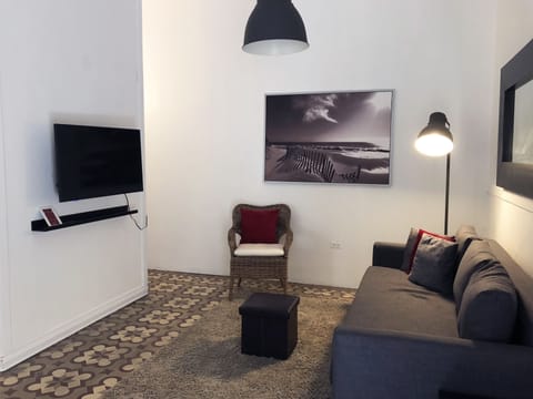 Apartment, 2 Bedrooms | Living room | Flat-screen TV