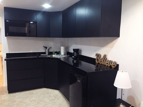 Apartment, Multiple Beds | Private kitchen | Fridge, microwave, oven, stovetop