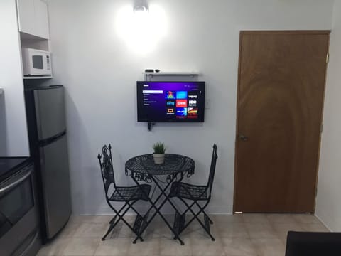 Apartment, 1 Bedroom | Living area | Flat-screen TV