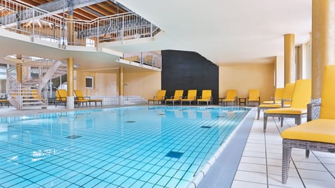 Indoor pool, outdoor pool, pool umbrellas, sun loungers