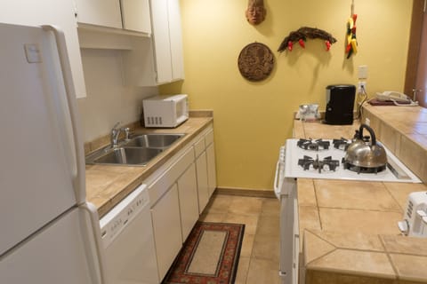 Condo, 1 Bedroom | Private kitchen | Fridge, microwave, dishwasher, coffee/tea maker